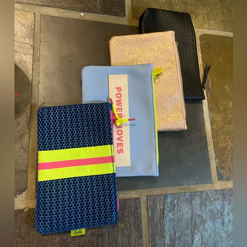 Four Ipsy bags, random selection